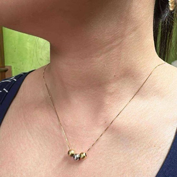 Elegant Gold and Silver Bead Necklace